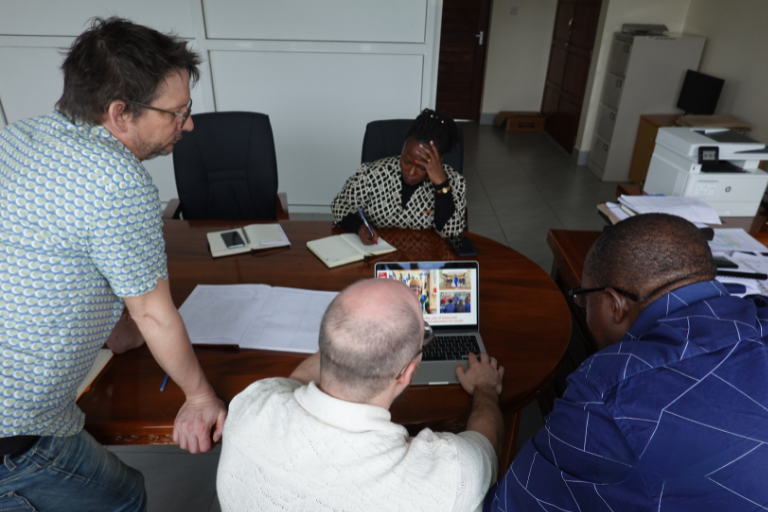 Volunteer documenting project outcomes and impact stories for a Tanzanian NGO.