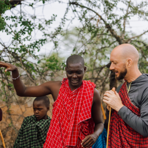 Volunteer connecting with local community member in Arusha Tanzania